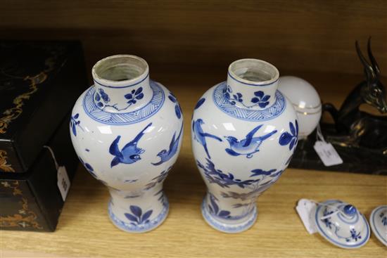 A pair of Chinese blue and white vases and covers, kangxi period Height 26cm